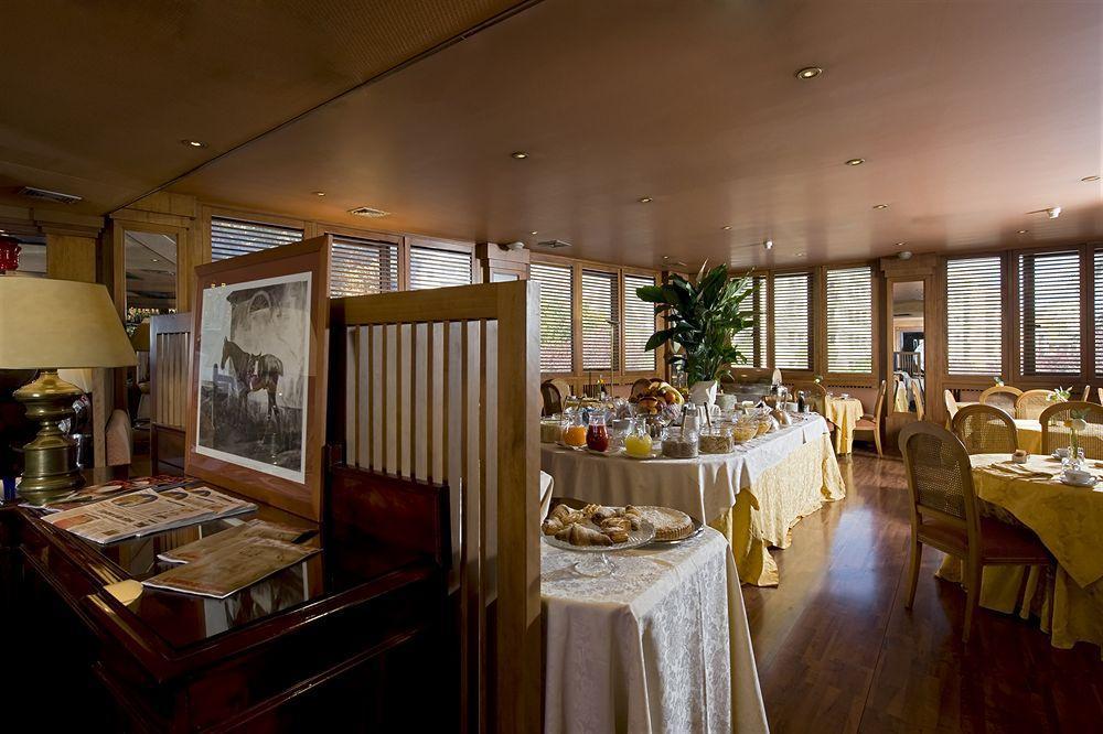 Polo Hotel Roma Restaurant bilde